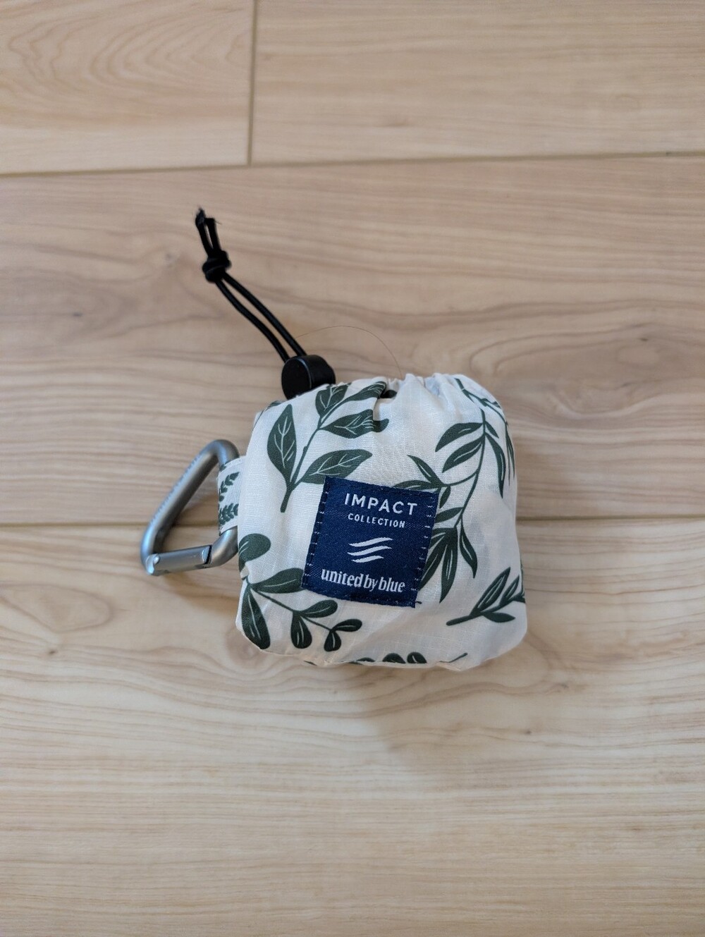 United By Blue Cream and Green Leaf Print Packable Reusable Bag